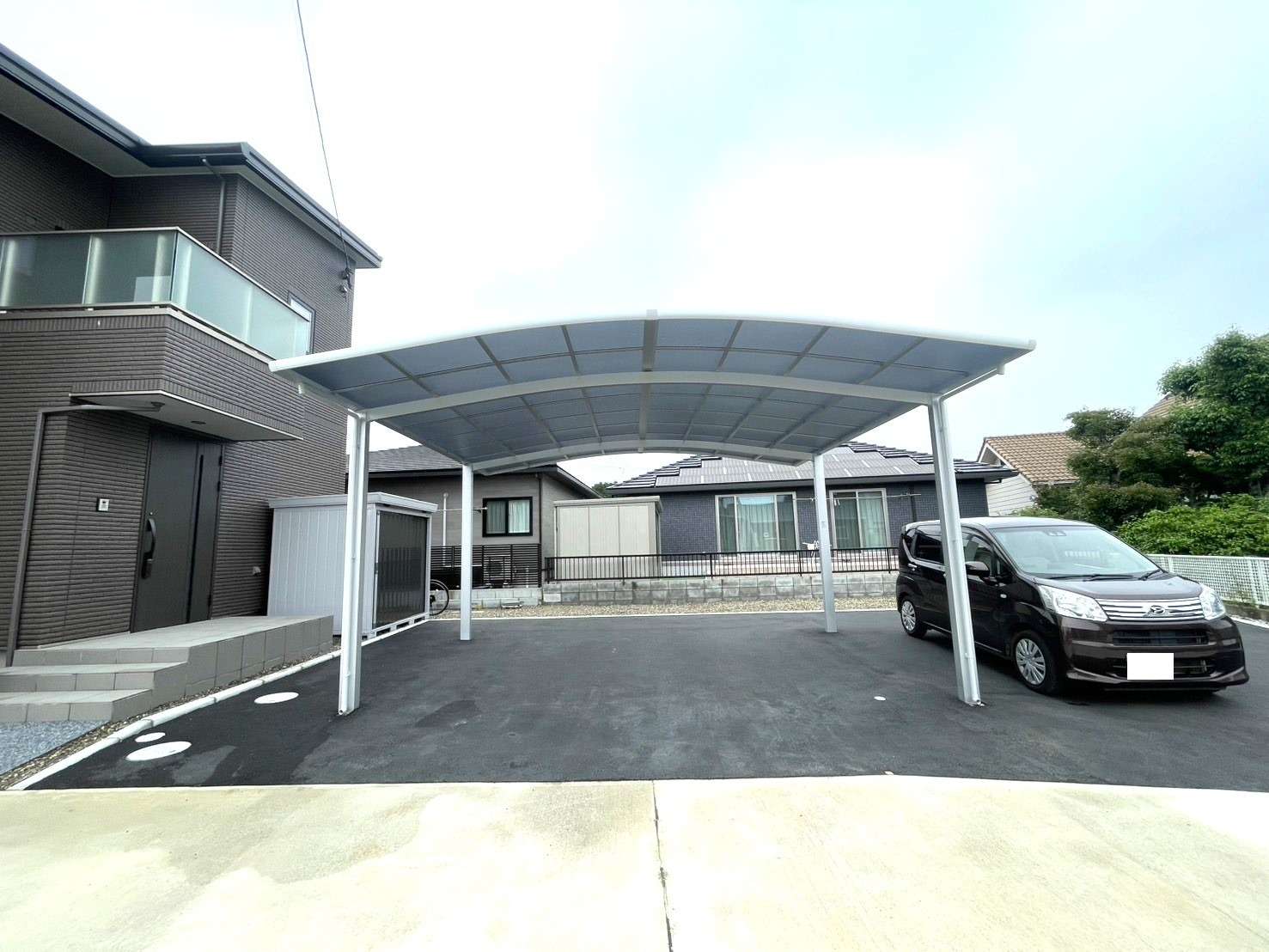 水はけのよいラウンド型屋根のカーポート｜大分市